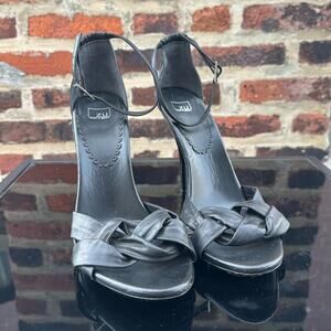 Elegant Brazilian woven black leather sandals with stiletto heel and ankle strap